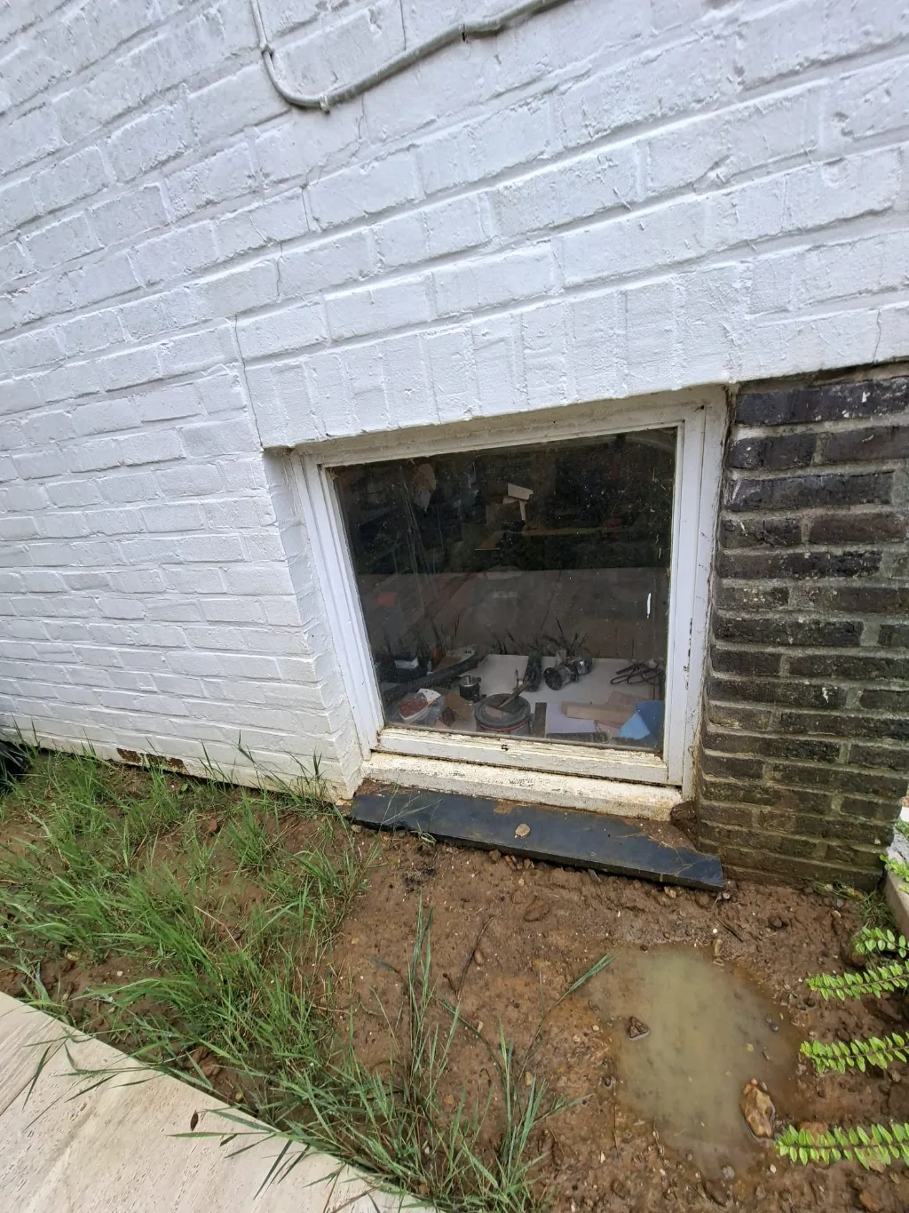 Before: old timber cellar window