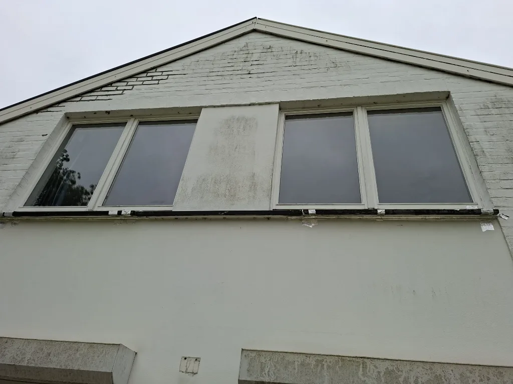 Before: old band of windows on the façade