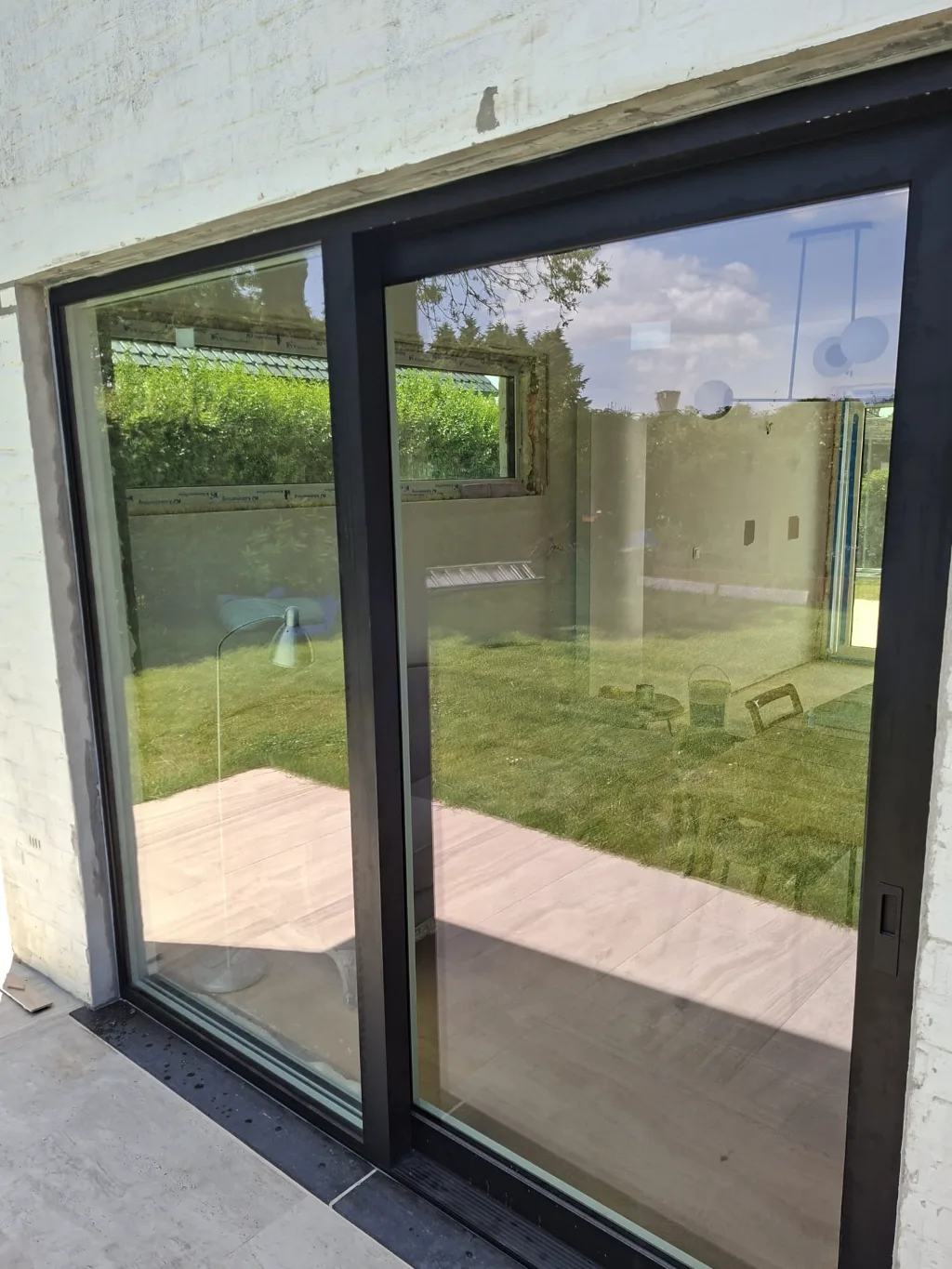 After: black-framed window with 2 sashes