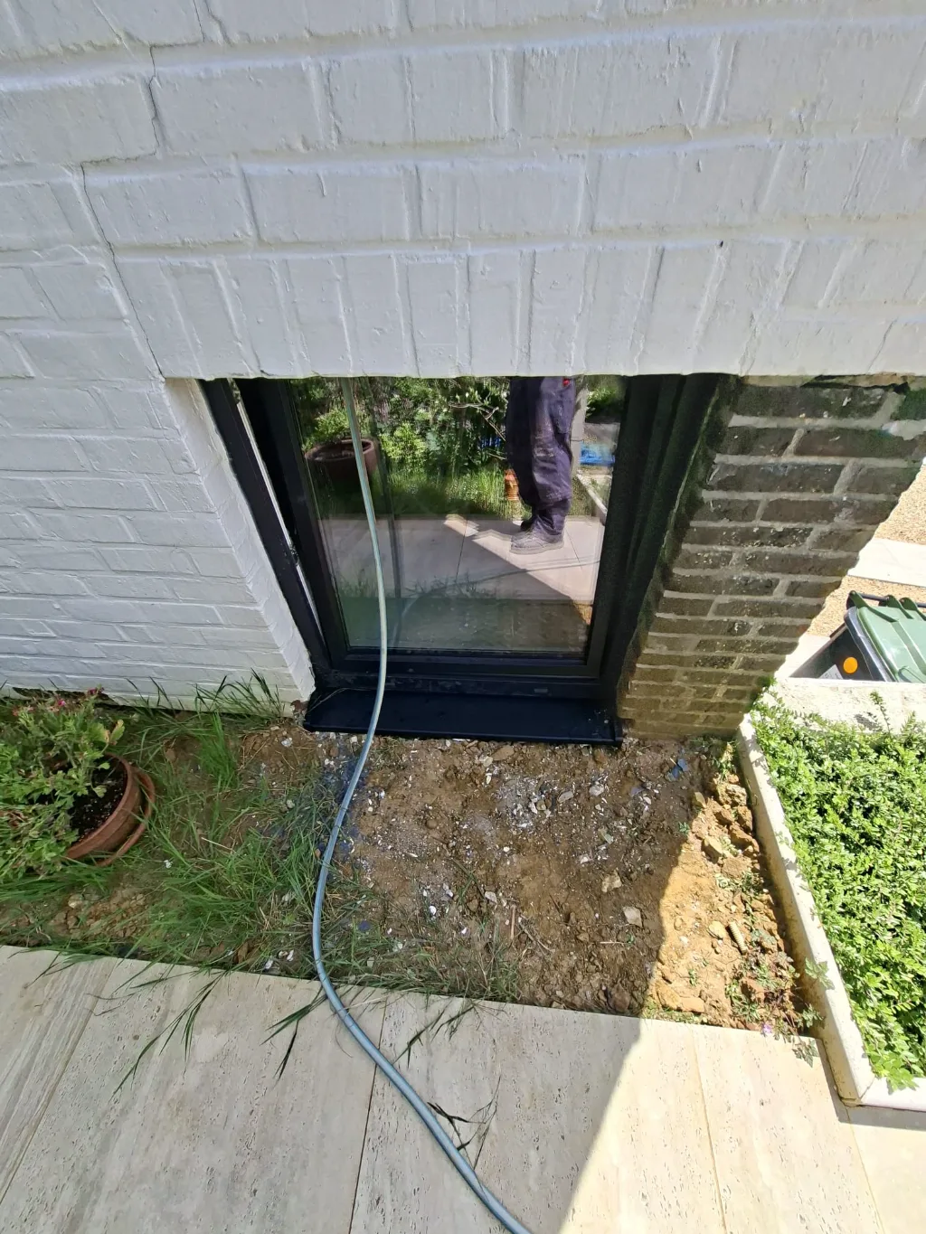 After: new small black gable window