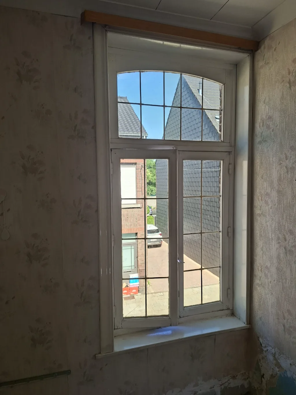 Before: old timber bedroom window with glazing bars