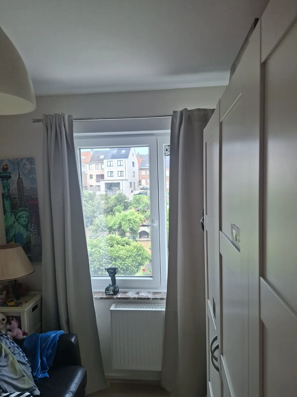 After: new white PVC bedroom window with glazing bars