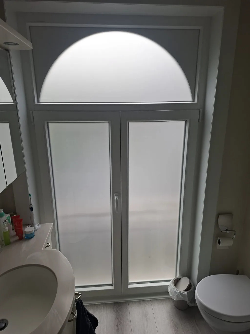 After: new arched white PVC window