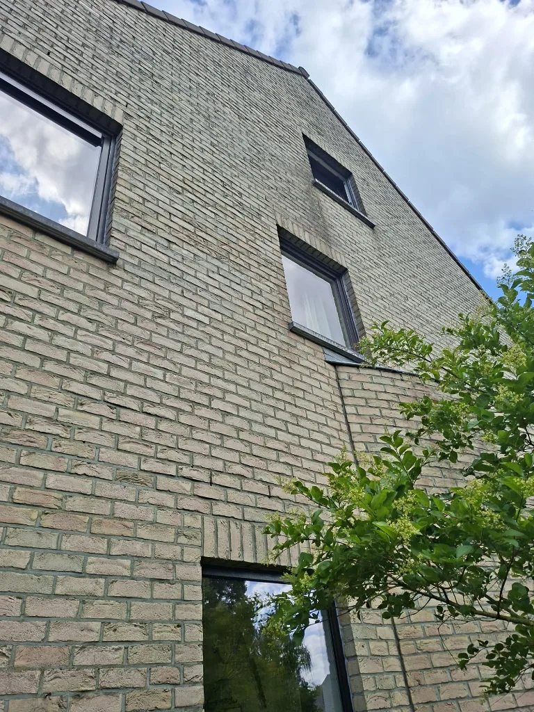 After: rear façade with anthracite PVC windows