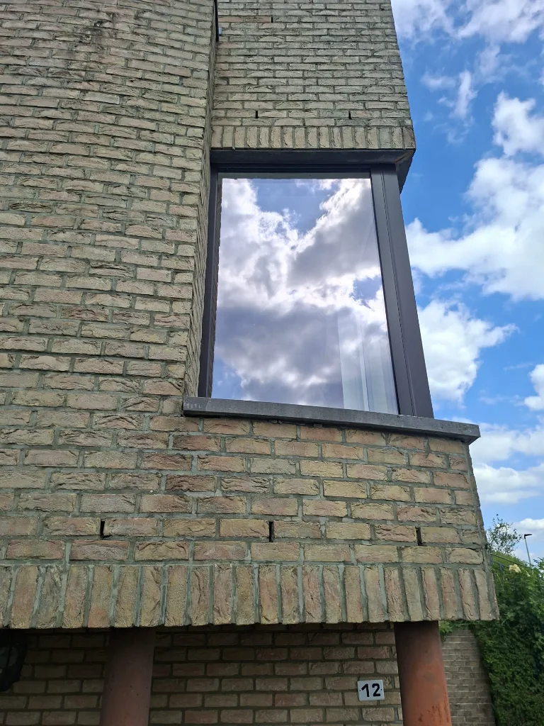 After: corner window in anthracite PVC