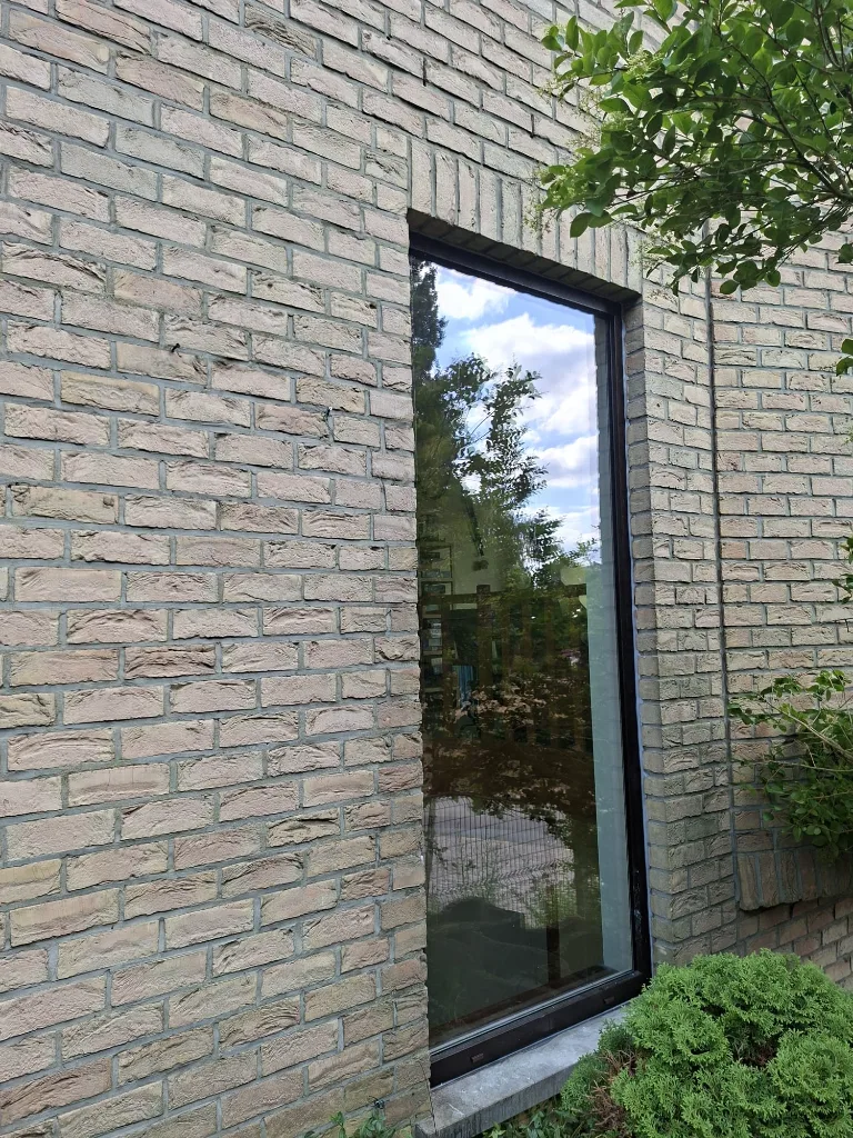 After: new anthracite PVC glazed bay on the garden side