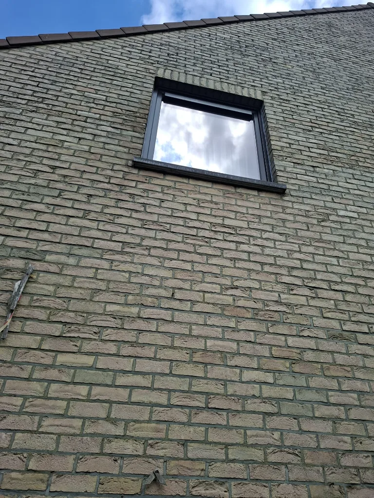 After: anthracite PVC roof window