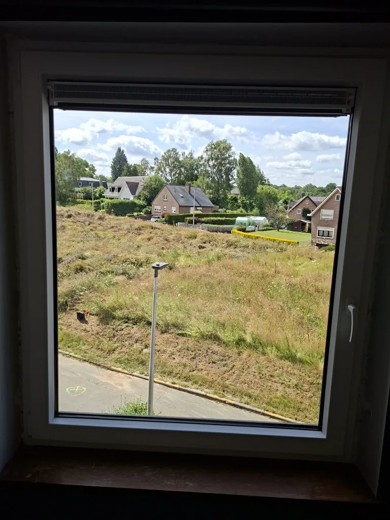 After: new white PVC window, interior view